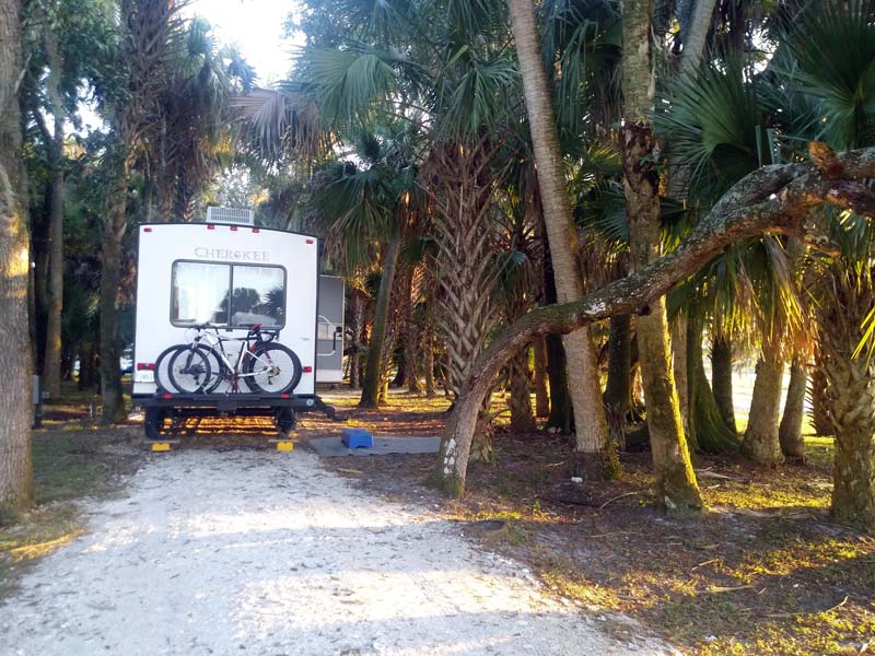 Cherokee RV parked at City Lickers Inc. in Fort Pierce, Florida, Workampers Amber & Dylan DeGan