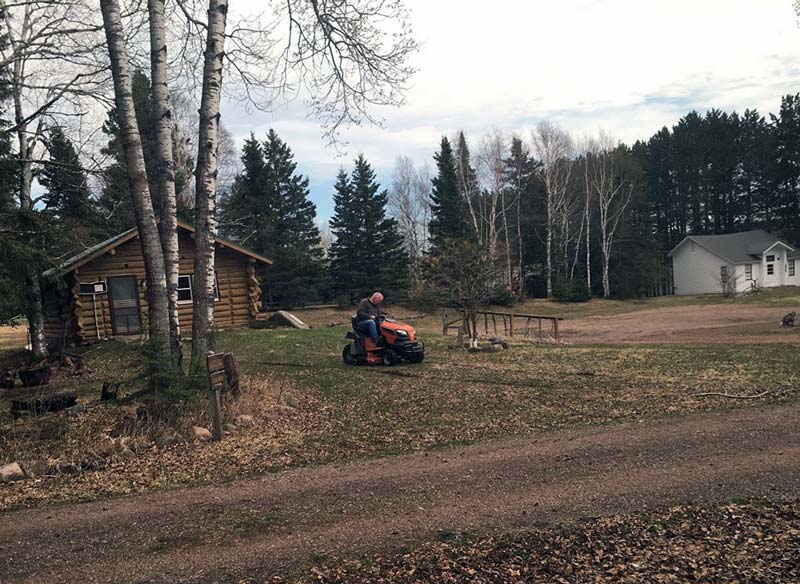 phil mowing welcome center 002