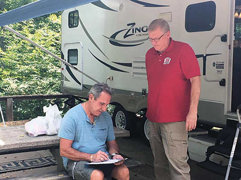 village volunteer john perry comment cards