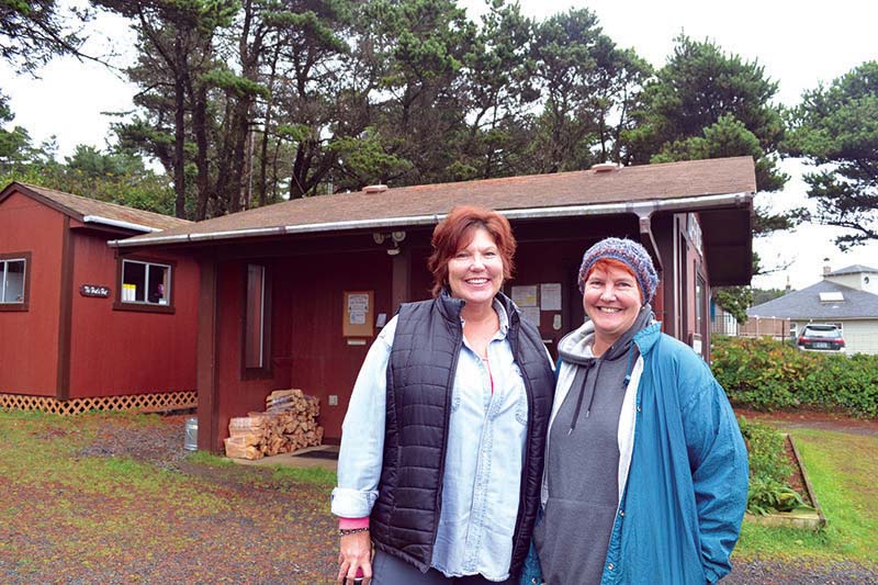 Two female Workampers in front of RV park office