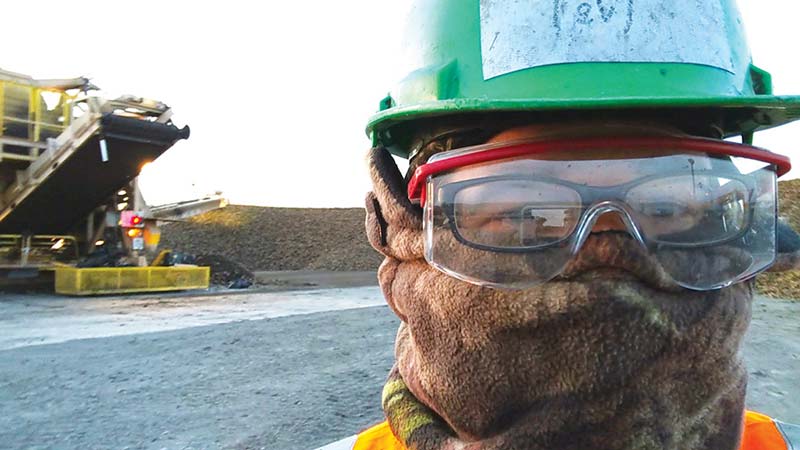 Sugar beet Workamper wearing protective gear for harvest.