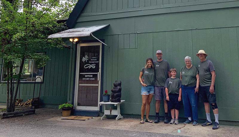 Campground staff at Lake Eufaula posing outside the office building.