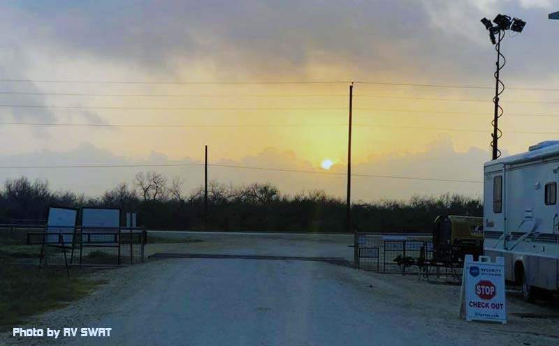 Campground gate guard booth at sunset, showing the view from the booth where Workampers manage entry.