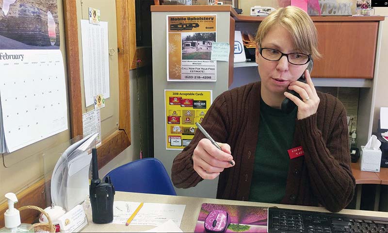 Woman Working in RV Park Office