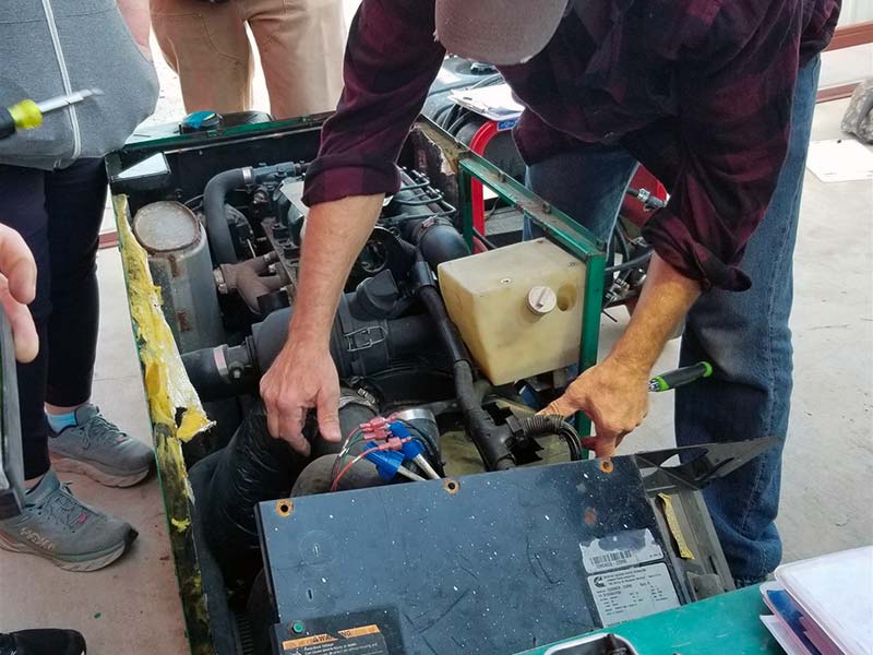 nrvta student works on a generator during hands on lab