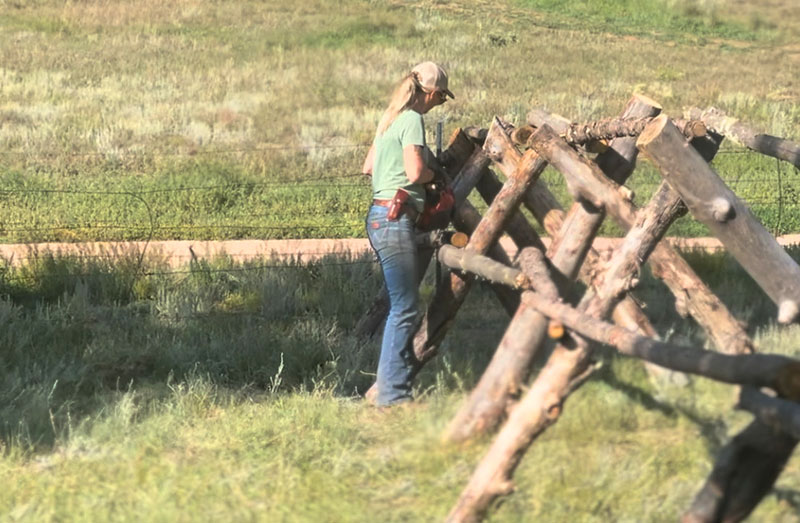 m lazy c ranch workamper tending to a fence