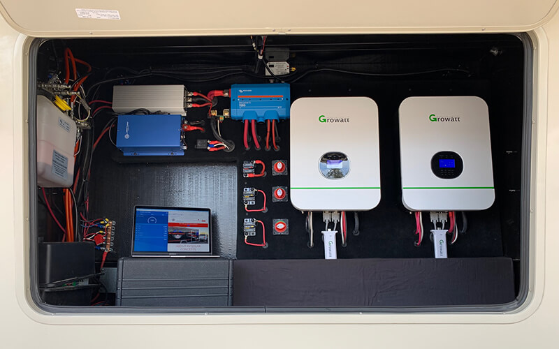 closeup of a finished solar install in fifth wheel compartment