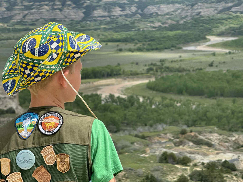 timothy syfrett with junior ranger badges