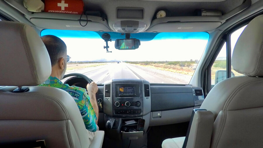 Sam Gennawey behind the wheel of his 2012 airstream interstate van