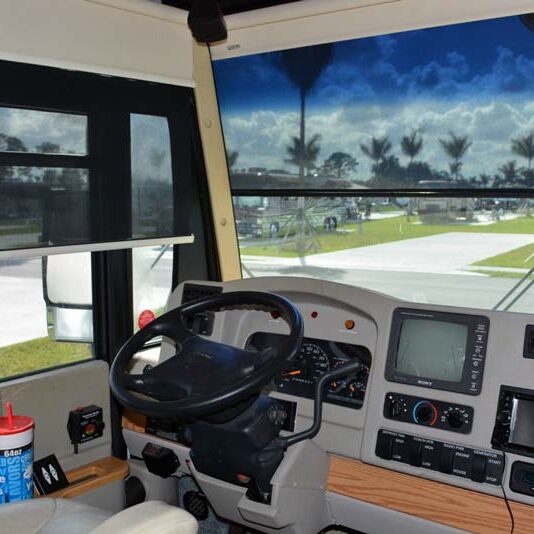 Example of an RV window with the daytime shade down, illustrating light control inside the vehicle.