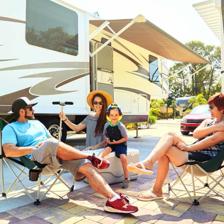 Family Outside Camper