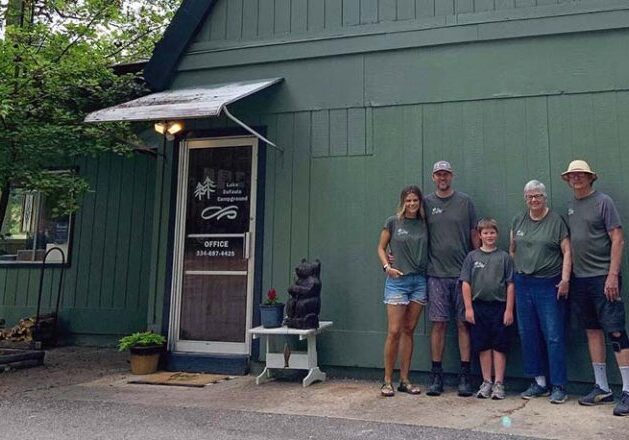 Campground staff at Lake Eufaula posing outside the office building.