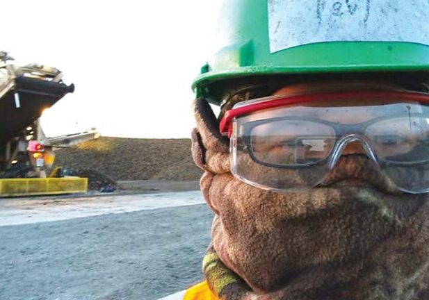 Sugar beet Workamper wearing protective gear for harvest.