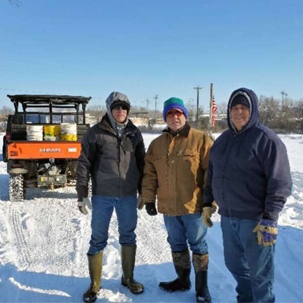 Workamper volunteers stepped up during Texas’ historic 2021 winter storm, three men working in the snow at Northeast Texas Community College.