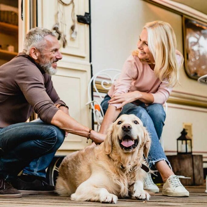RV Couple With Dog