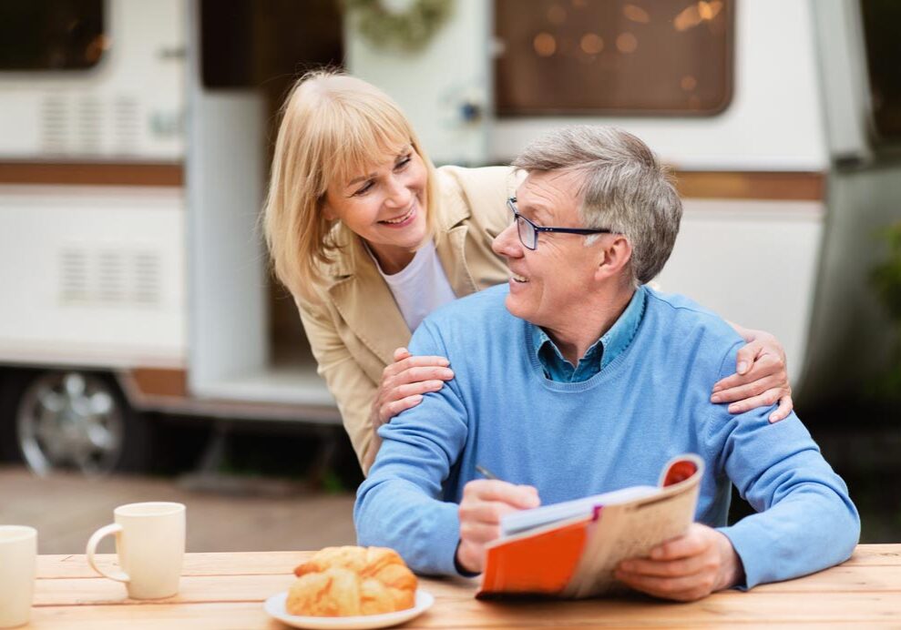 Couple Outside RV